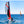 Load image into Gallery viewer, Minicat 420 Evoque Red sailing agressively on the water