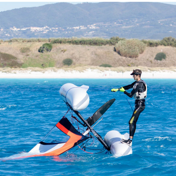 Minicat 420 flipped over and is in the process of being righted on the water