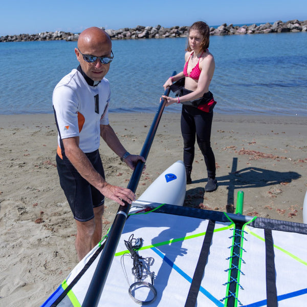 MiniCat Guppy being assembled on a beach