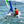 Load image into Gallery viewer, MiniCat Guppy being solo sailed on the water

